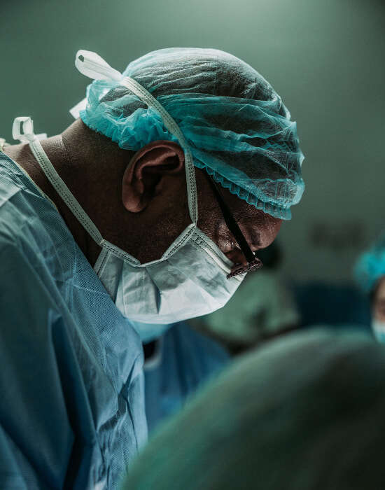 surgeon performing an operation